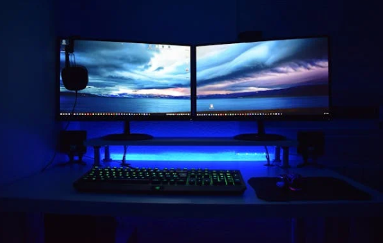 2 large desktop screens